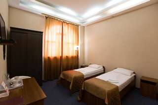 Гостиница Антей Новосибирск Улучшенный двухместный номер с 2 отдельными кроватями-1